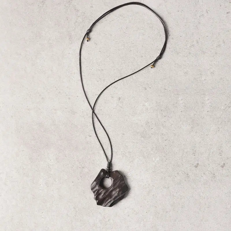 Buddha Stones Ebony Wood Hollow Irregular Shape Peace Balance Necklace Pendant BS