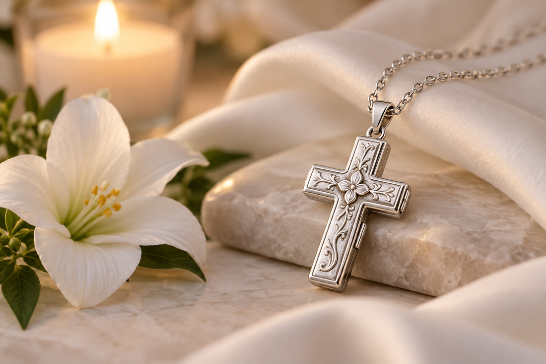 Silver memorial cross locket with a white flower and candle