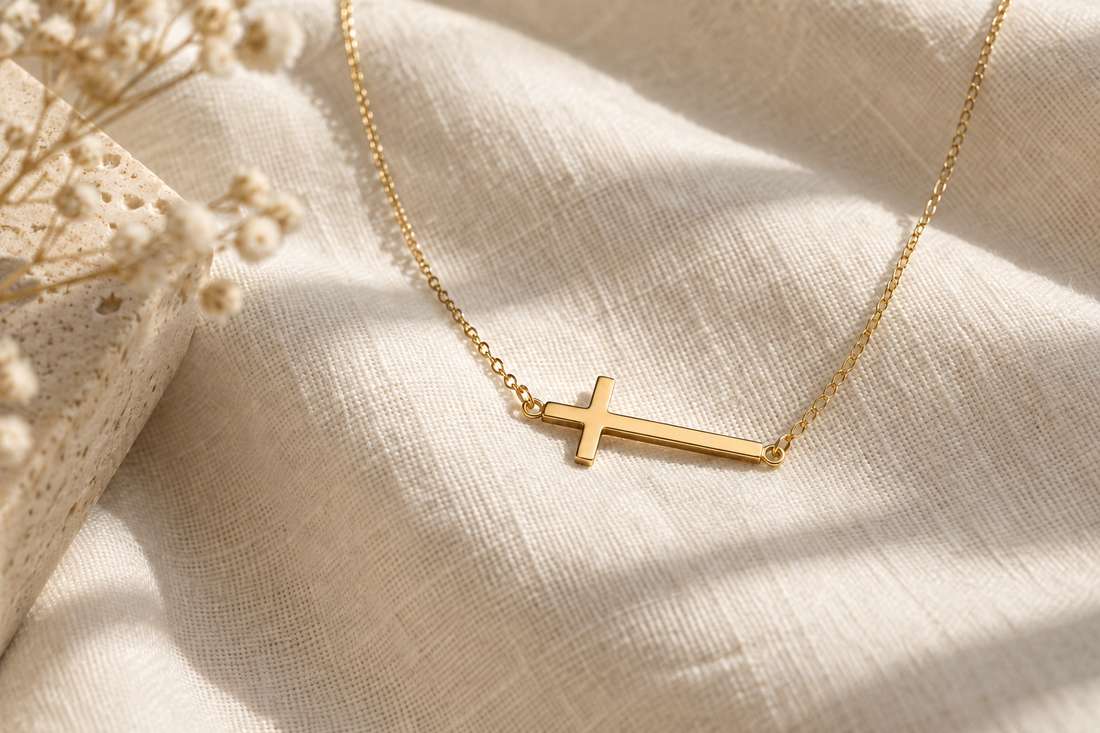 Gold sideways cross necklace symbolizing faith and modern style