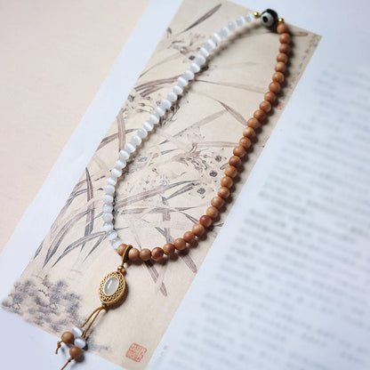 Bracelet en cristal de perles Dzi à trois yeux en œil de chat et bois de santal purifiant et guérisseur 