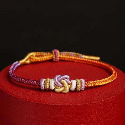 Bracelet tressé en corde colorée avec nœud en forme de cœur et protection chance 