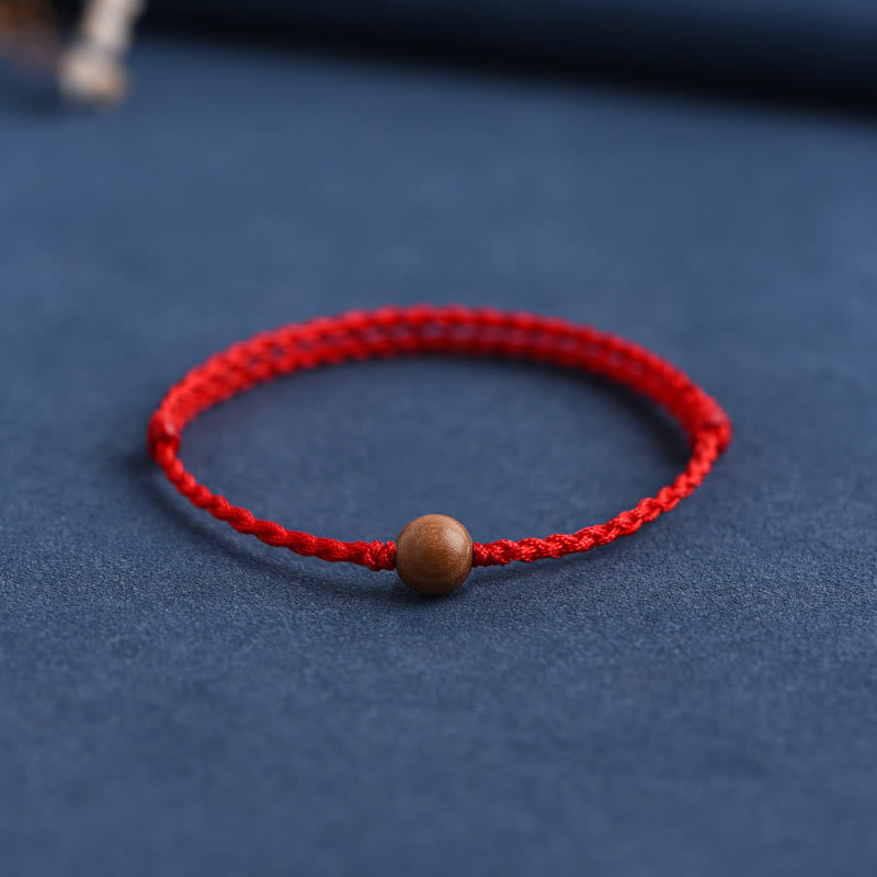 Bracelet tressé en perles de bois de pêche naturel Buddha Stones pour éloigner les mauvais esprits