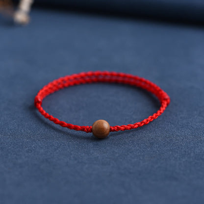 Bracelet tressé en perles de bois de pêche naturel Buddha Stones pour éloigner les mauvais esprits