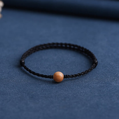 Bracelet tressé en perles de bois de pêche naturel Buddha Stones pour éloigner les mauvais esprits