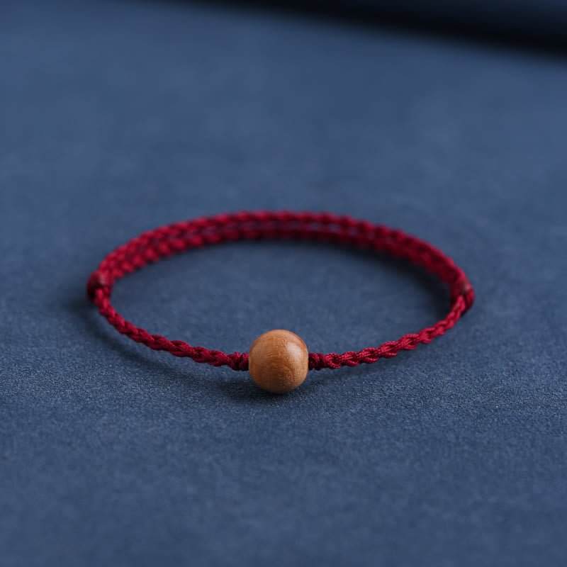 Bracelet tressé en perles de bois de pêche naturel Buddha Stones pour éloigner les mauvais esprits
