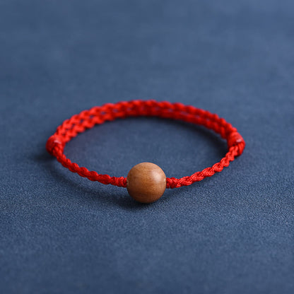 Bracelet tressé en perles de bois de pêche naturel Buddha Stones pour éloigner les mauvais esprits