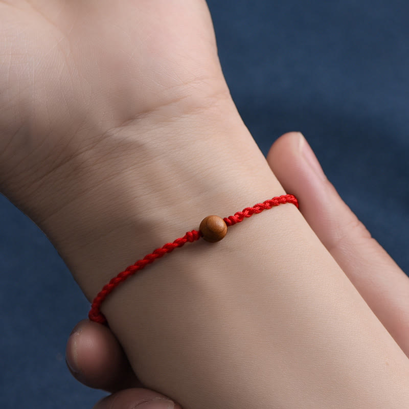 Bracelet tressé en perles de bois de pêche naturel Buddha Stones pour éloigner les mauvais esprits