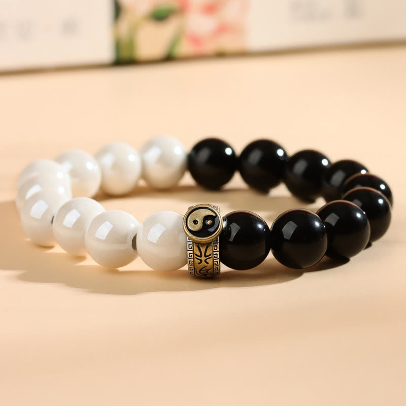 Bracelet Yin Yang en obsidienne noire et perles de porcelaine blanche 