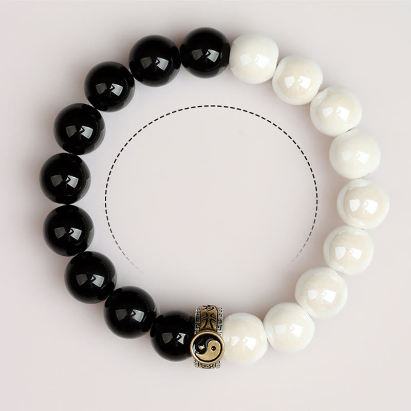 Bracelet Yin Yang en obsidienne noire et perles de porcelaine blanche 