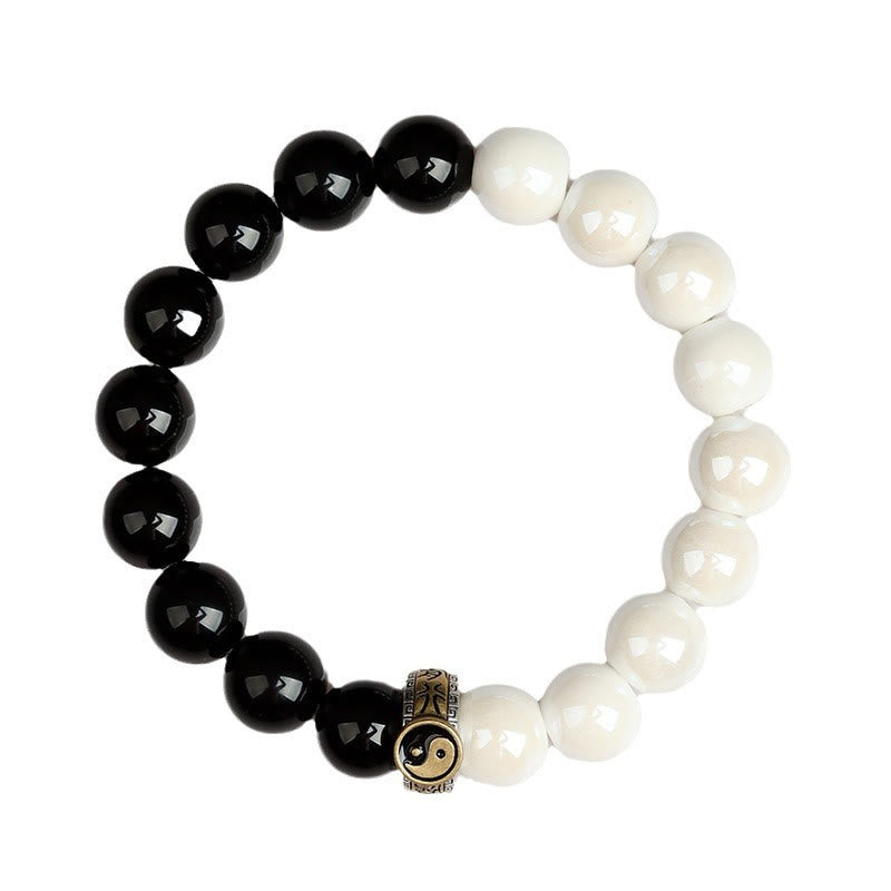 Bracelet Yin Yang en obsidienne noire et perles de porcelaine blanche 