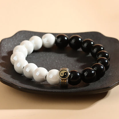Bracelet Yin Yang en obsidienne noire et perles de porcelaine blanche 