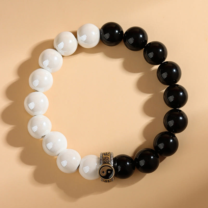 Bracelet Yin Yang en obsidienne noire et perles de porcelaine blanche 