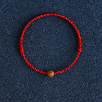 Bracelet tressé en perles de bois de pêche naturel Buddha Stones pour éloigner les mauvais esprits