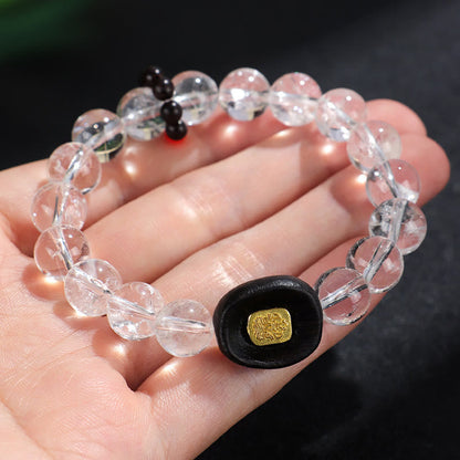 Bracelet de guérison Sak Yant Zashi Lhamo en bois d'ébène et cristal blanc Bouddha Stones 