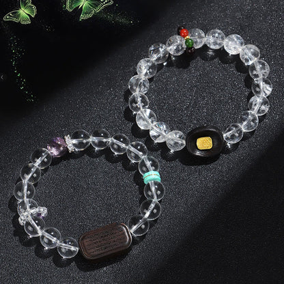 Bracelet de guérison Sak Yant Zashi Lhamo en bois d'ébène et cristal blanc Bouddha Stones 