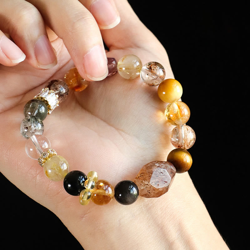 Bracelet de positivité œil de tigre en obsidienne et topaze en cristal Super Seven de Buddha Stones 