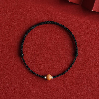 Bracelet de cheville tressé en perles de bois de pêcher naturel avec pierres de Bouddha