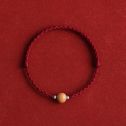 Bracelet de cheville tressé en perles de bois de pêcher naturel avec pierres de Bouddha