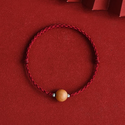 Bracelet de cheville tressé en perles de bois de pêcher naturel avec pierres de Bouddha