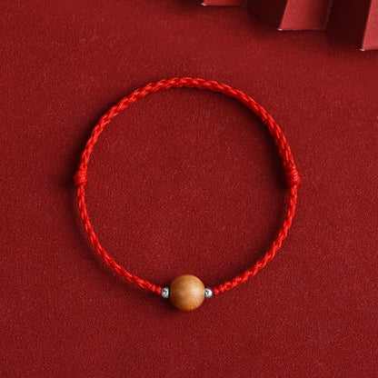 Bracelet de cheville tressé en perles de bois de pêcher naturel avec pierres de Bouddha