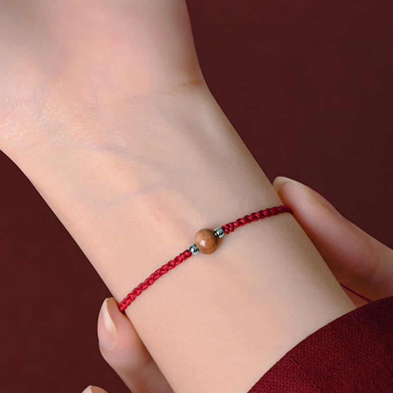 Bracelet de cheville tressé en perles de bois de pêcher naturel avec pierres de Bouddha