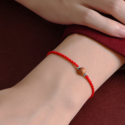 Bracelet de cheville tressé en perles de bois de pêcher naturel avec pierres de Bouddha
