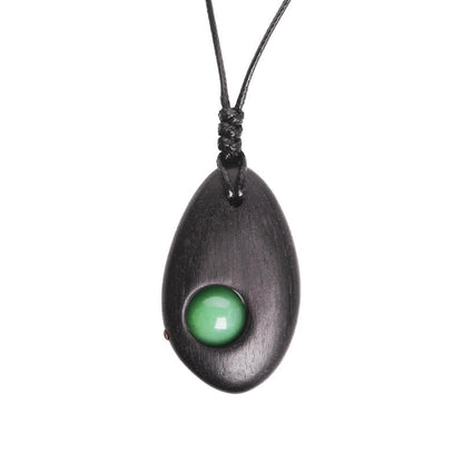 Collier pendentif en aventurine verte et bois d'ébène avec pierres de Bouddha, paix et calme 