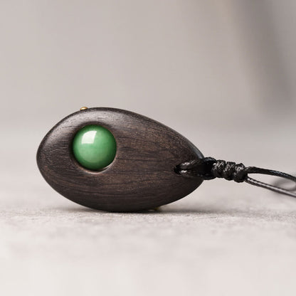 Collier pendentif en aventurine verte et bois d'ébène avec pierres de Bouddha, paix et calme 
