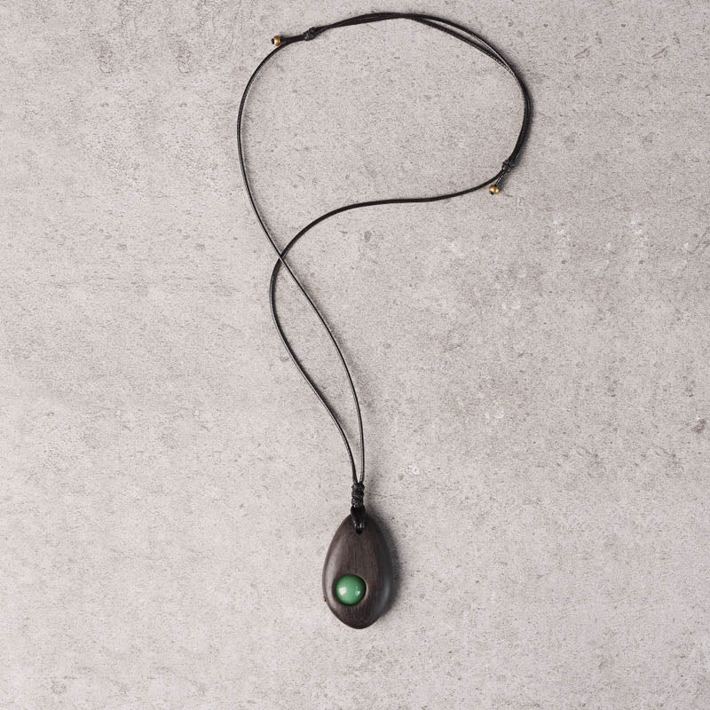 Collier pendentif en aventurine verte et bois d'ébène avec pierres de Bouddha, paix et calme 