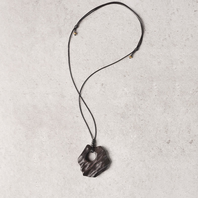 Collier pendentif en bois d'ébène creux de forme irrégulière, pierres de Bouddha, équilibre de la paix 