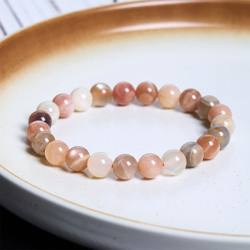 Bracelet de guérison en pierre de lune pêche et pierre de Bouddha