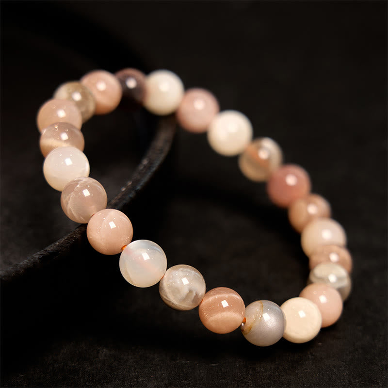Bracelet de guérison en pierre de lune pêche et pierre de Bouddha