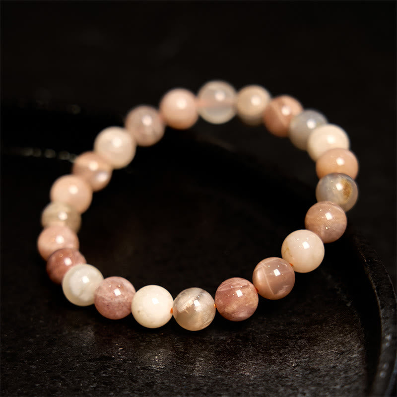 Bracelet de guérison en pierre de lune pêche et pierre de Bouddha