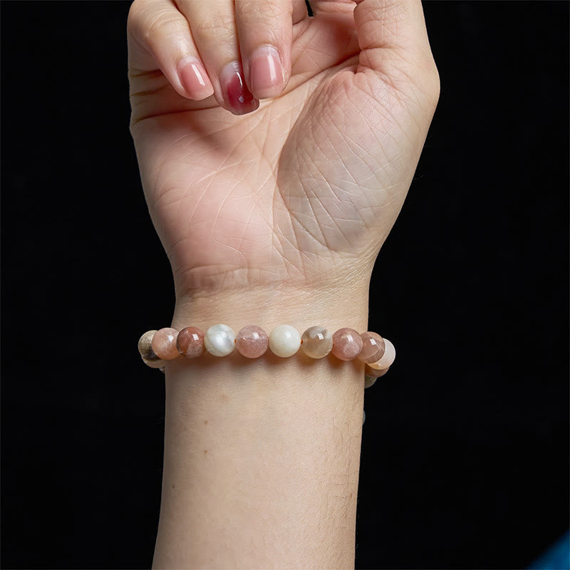 Bracelet de guérison en pierre de lune pêche et pierre de Bouddha