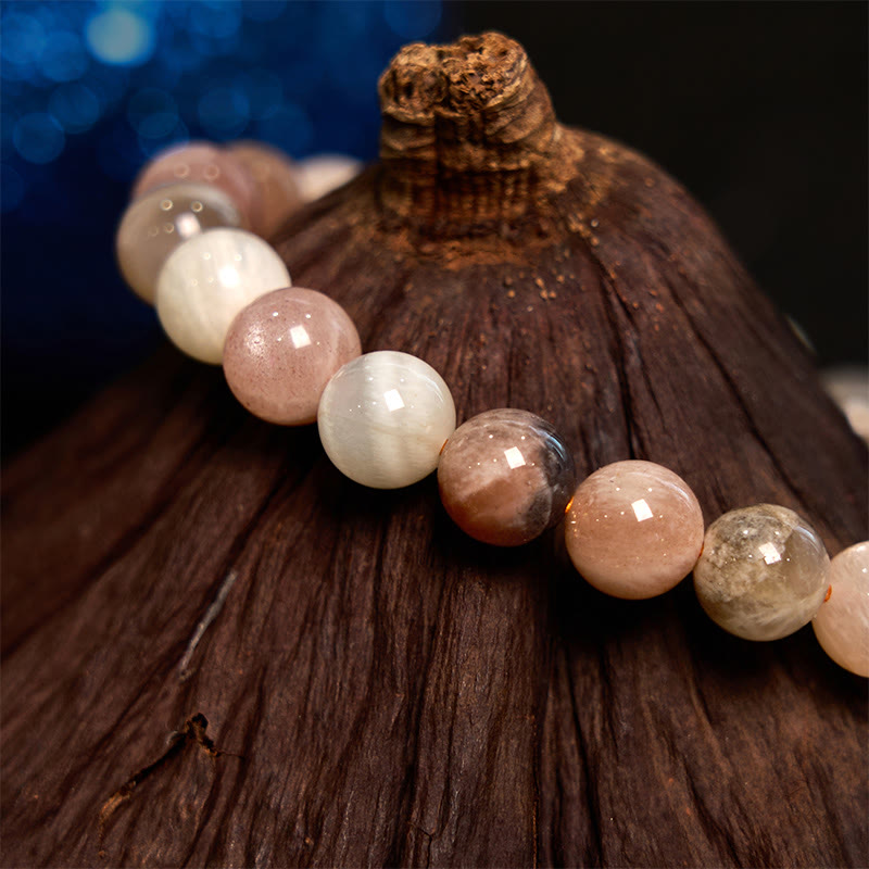Bracelet de guérison en pierre de lune pêche et pierre de Bouddha