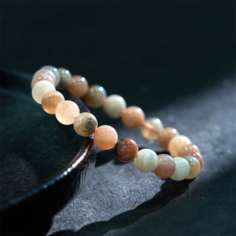 Bracelet de guérison en pierre de lune pêche et pierre de Bouddha