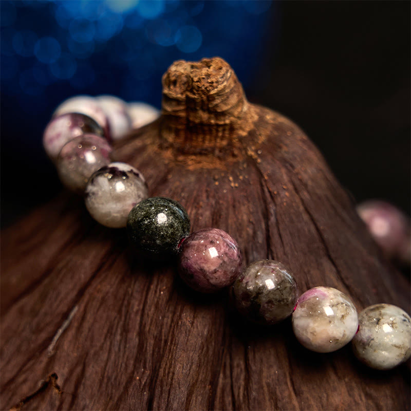 Bracelet d'équilibre en tourmaline fleur de prunier et pierre de Bouddha