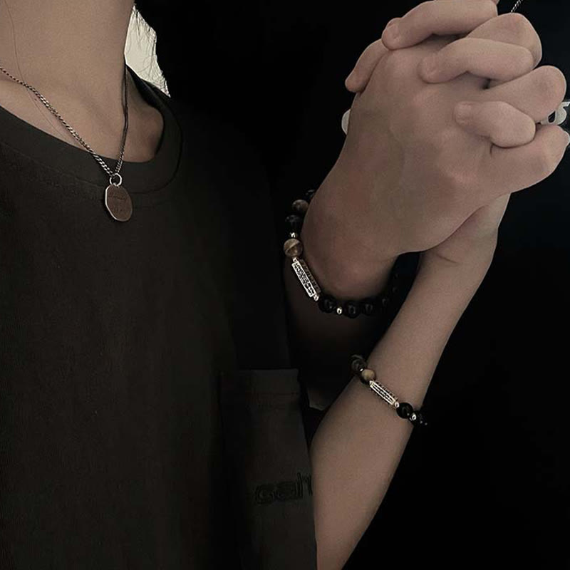Bracelet en obsidienne noire naturelle et œil de tigre avec six mots authentiques « om mani padme hum » et force et amour 