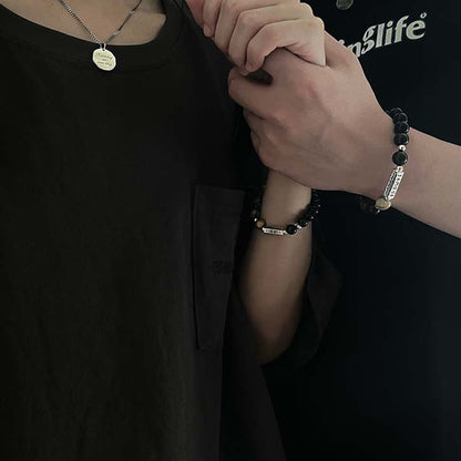 Bracelet en obsidienne noire naturelle et œil de tigre avec six mots authentiques « om mani padme hum » et force et amour 