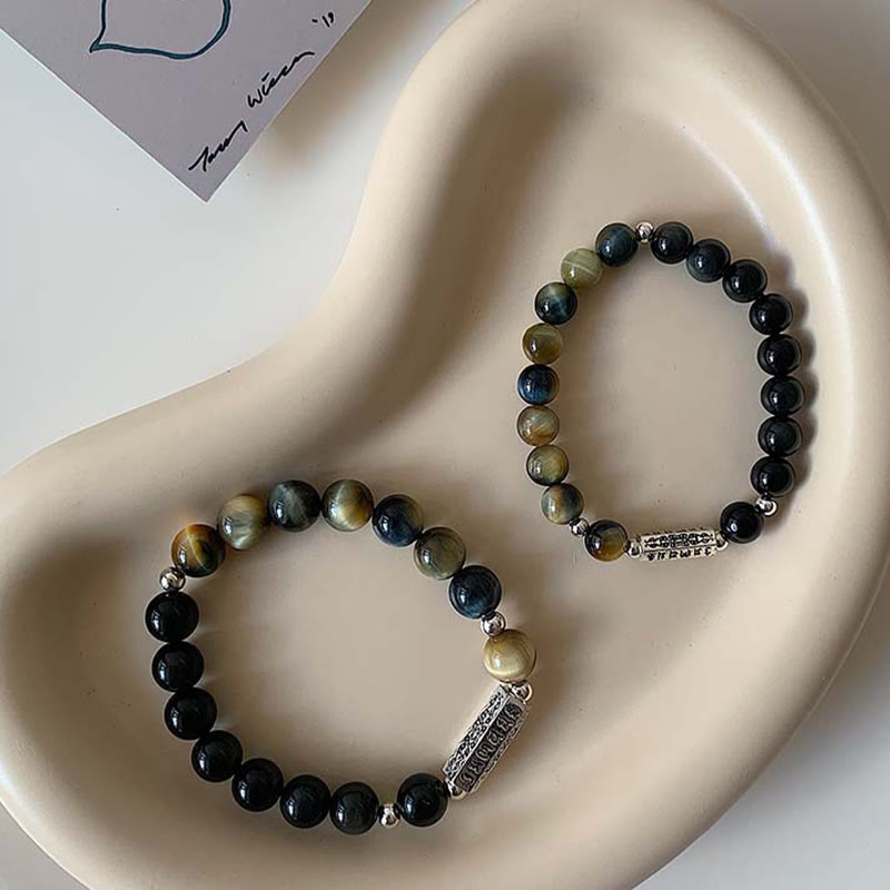 Bracelet en obsidienne noire naturelle et œil de tigre avec six mots authentiques « om mani padme hum » et force et amour 
