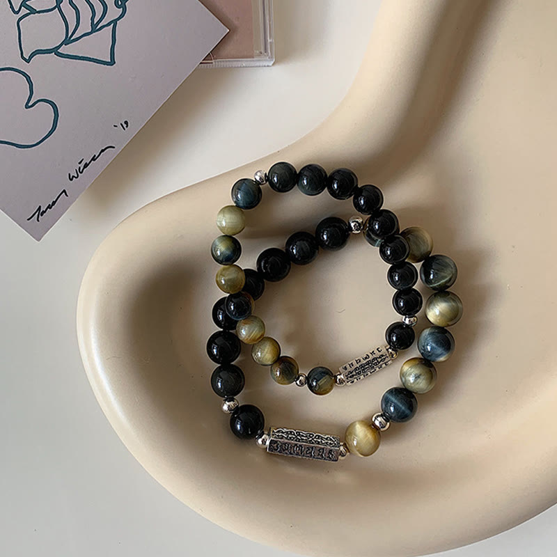 Bracelet en obsidienne noire naturelle et œil de tigre avec six mots authentiques « om mani padme hum » et force et amour 
