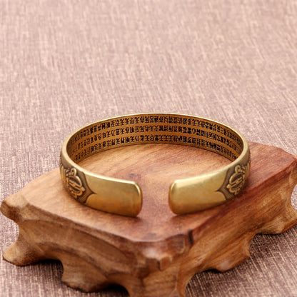 Bracelet porte-bonheur en cuivre avec les six mots véritables « Om Mani Padme Hum » et le Sutra du cœur