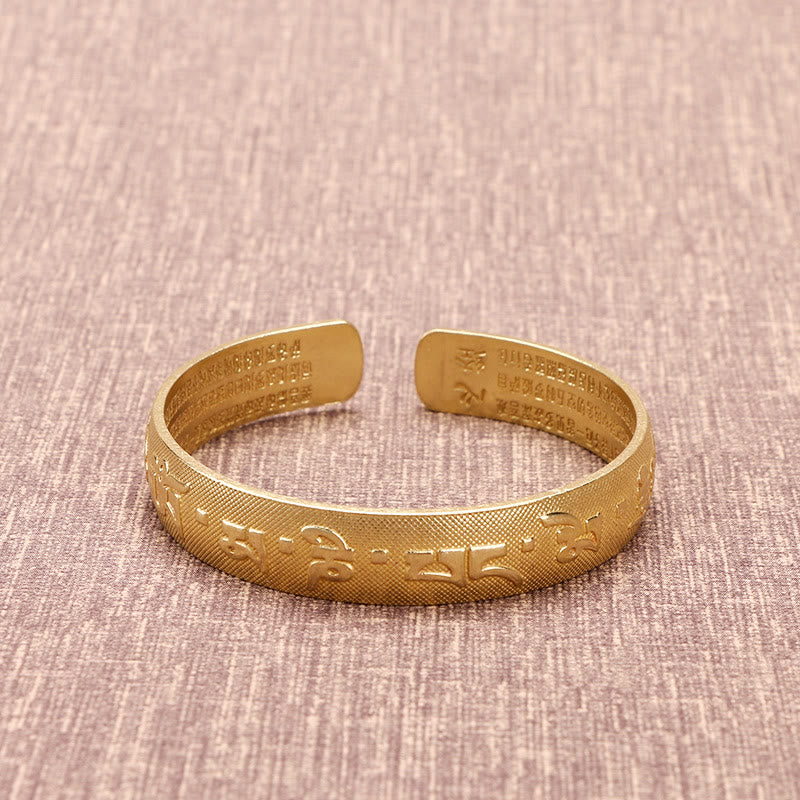 Bracelet porte-bonheur en cuivre avec les six mots véritables « Om Mani Padme Hum » et le Sutra du cœur
