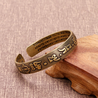 Bracelet porte-bonheur en cuivre avec les six mots véritables « Om Mani Padme Hum » et le Sutra du cœur