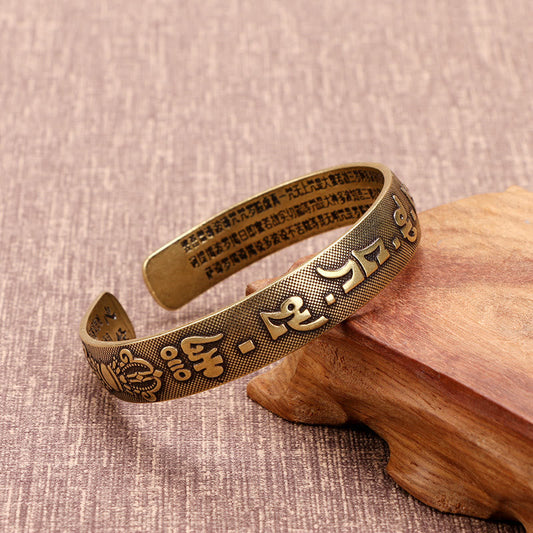 Bracelet porte-bonheur en cuivre avec les six mots véritables « Om Mani Padme Hum » et le Sutra du cœur