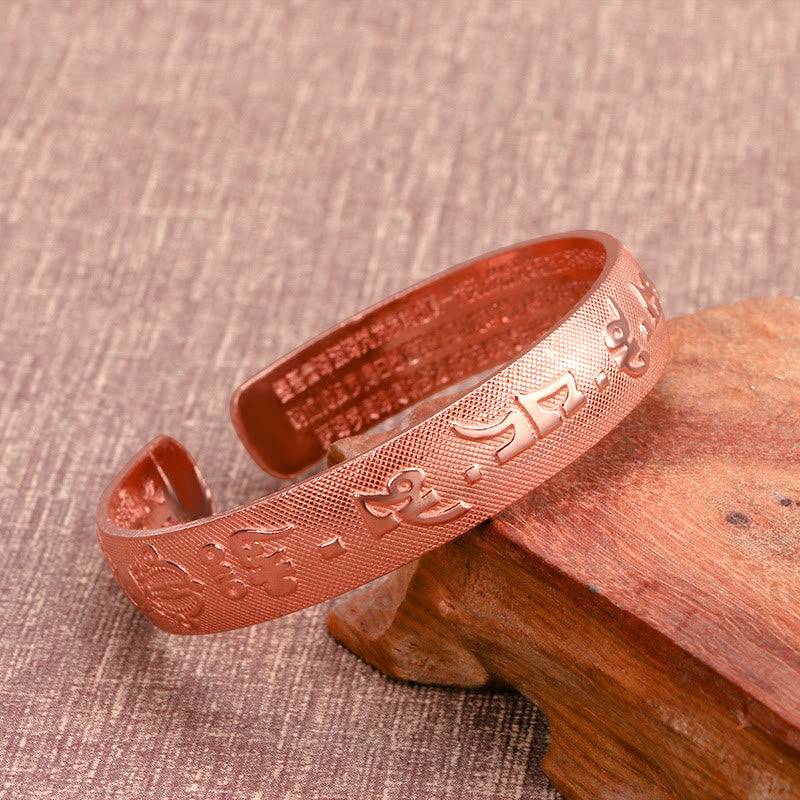 Bracelet porte-bonheur en cuivre avec les six mots véritables « Om Mani Padme Hum » et le Sutra du cœur