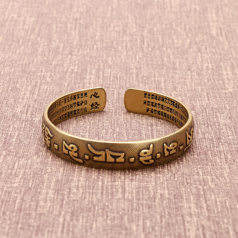 Bracelet porte-bonheur en cuivre avec les six mots véritables « Om Mani Padme Hum » et le Sutra du cœur