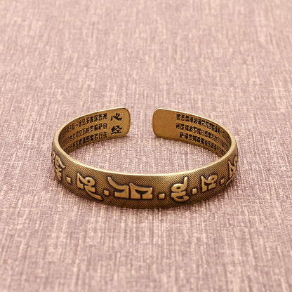 Bracelet porte-bonheur en cuivre avec les six mots véritables « Om Mani Padme Hum » et le Sutra du cœur
