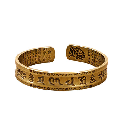 Bracelet manchette en cuivre avec six mots authentiques « om mani padme hum » et « sūtra du cœur », symbole de la paix et du lotus