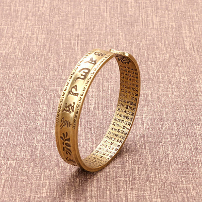 Bracelet manchette en cuivre avec six mots authentiques « om mani padme hum » et « sūtra du cœur », symbole de la paix et du lotus